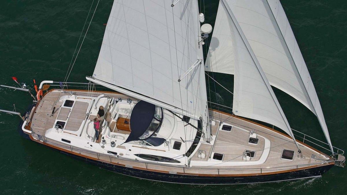 a boat on the water aboard MUSTIQUE Yacht for Charter