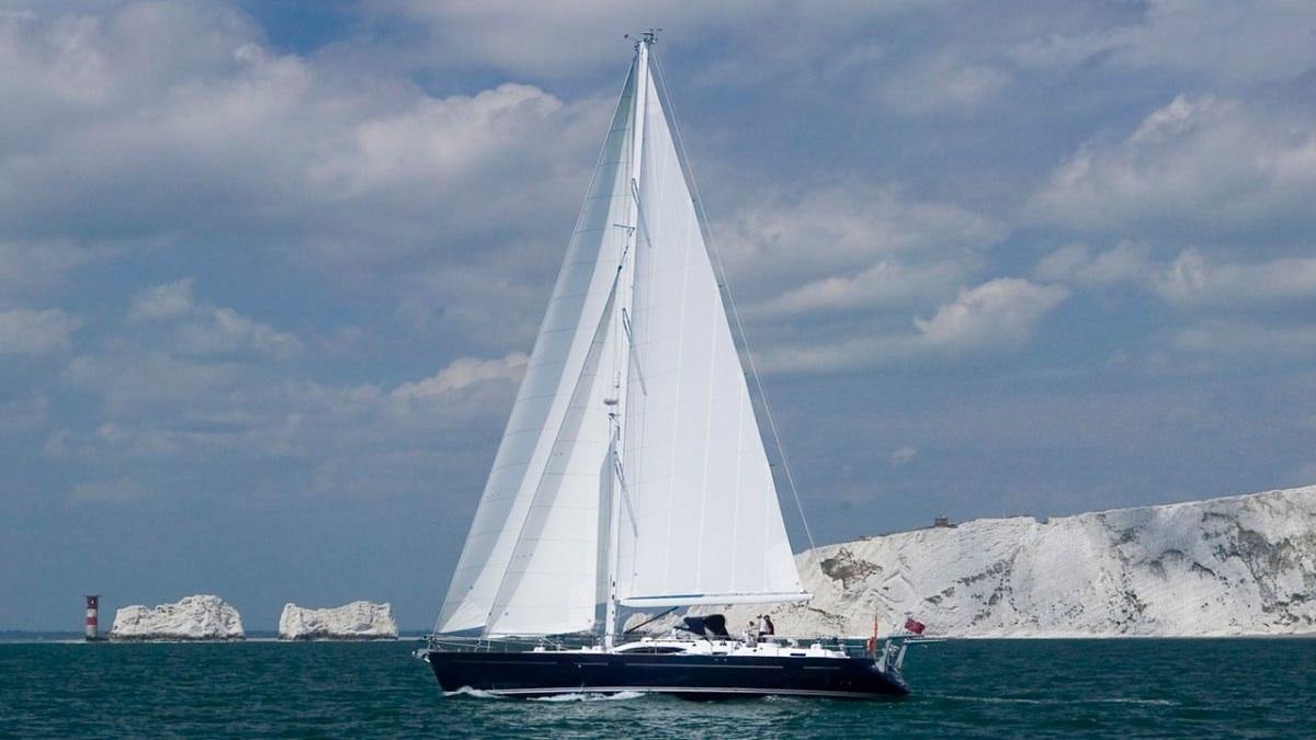 a sailboat in the water aboard MUSTIQUE Yacht for Charter