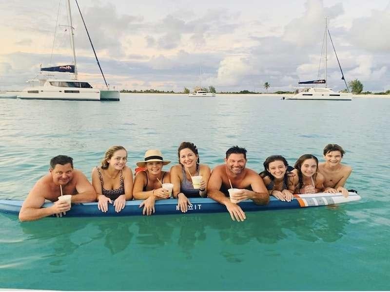 a group of people in a boat aboard LA LINEA Yacht for Charter