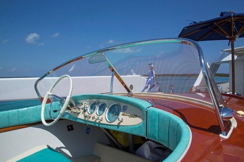 a person on a surfboard aboard LADY VICTORIA Yacht for Charter