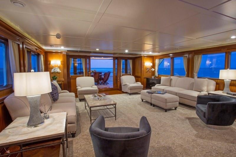 a living room with a large window aboard LADY VICTORIA Yacht for Charter