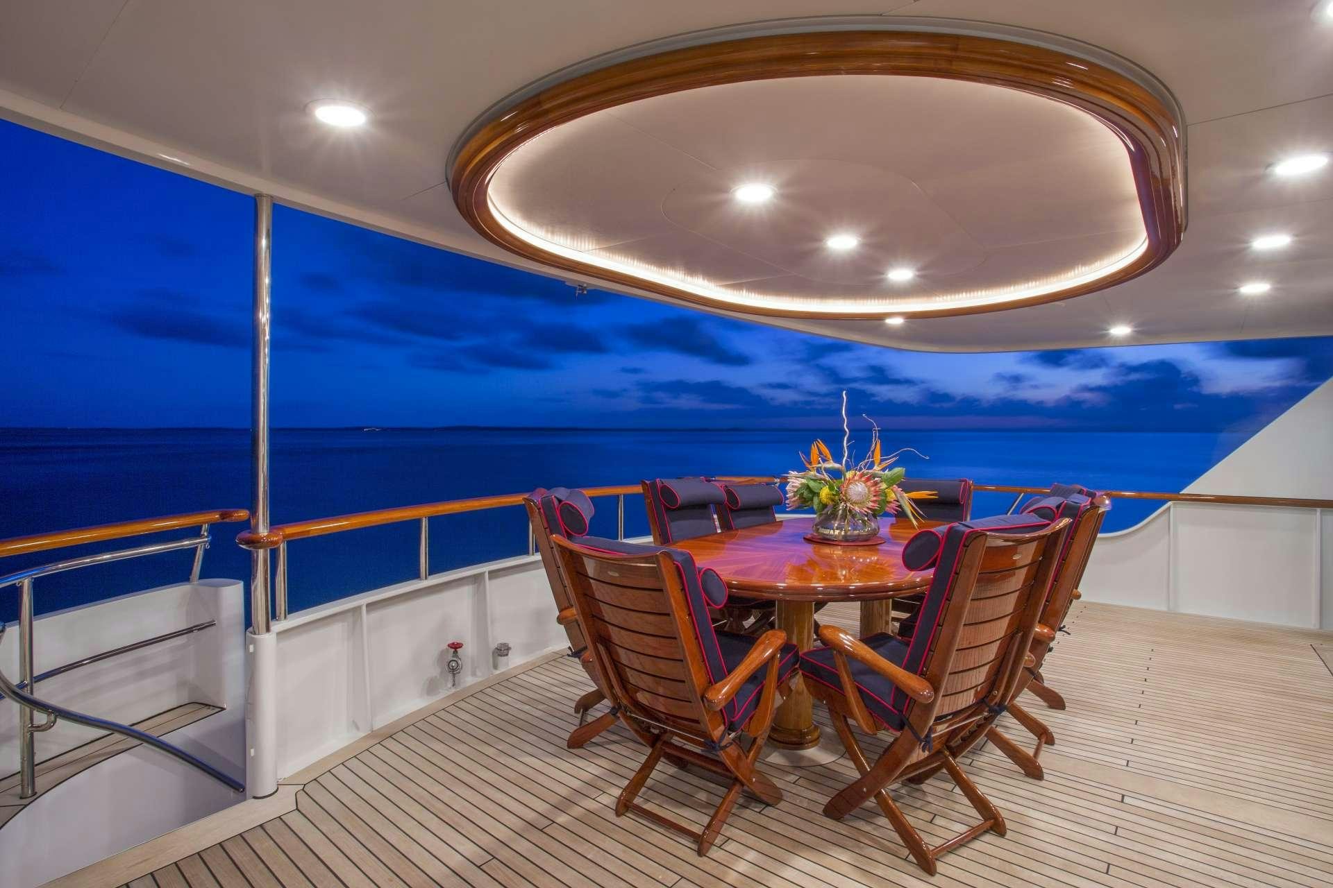 a room with a table and chairs aboard LADY VICTORIA Yacht for Charter