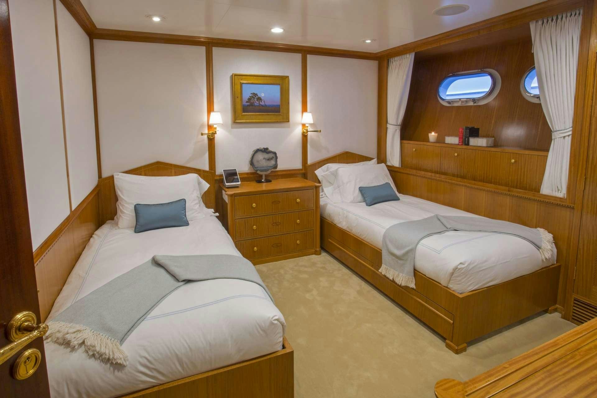 a room with two beds aboard LADY VICTORIA Yacht for Charter