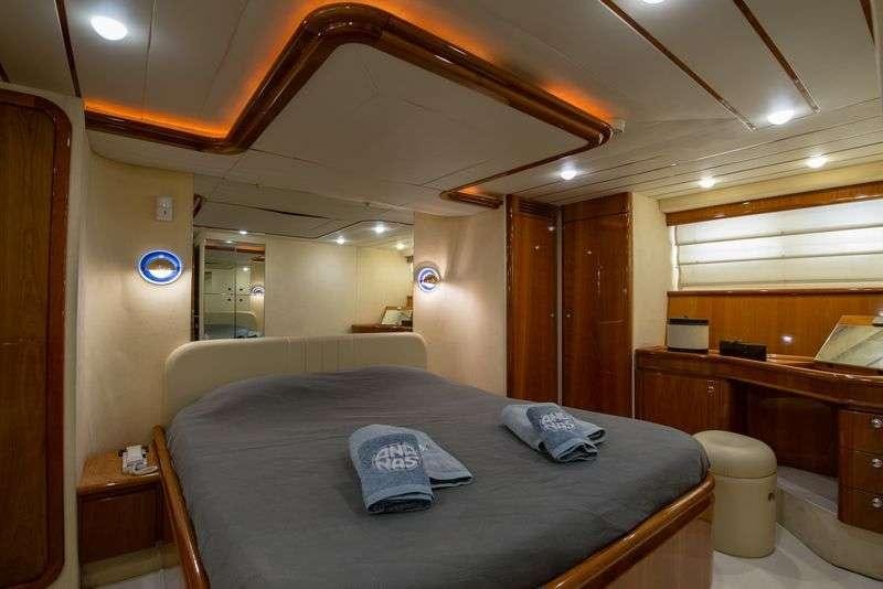 a bed in a room aboard ANANAS Yacht for Charter