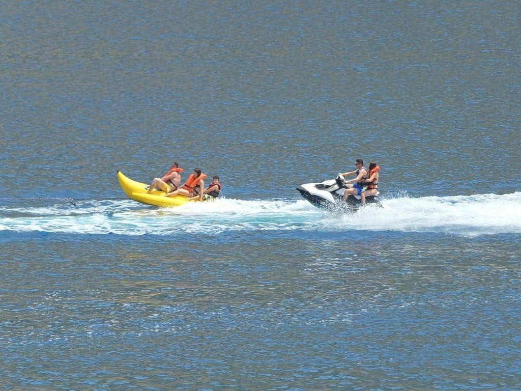 people on a yellow kayak aboard KAPTAN MEHMET BUGRA Yacht for Charter