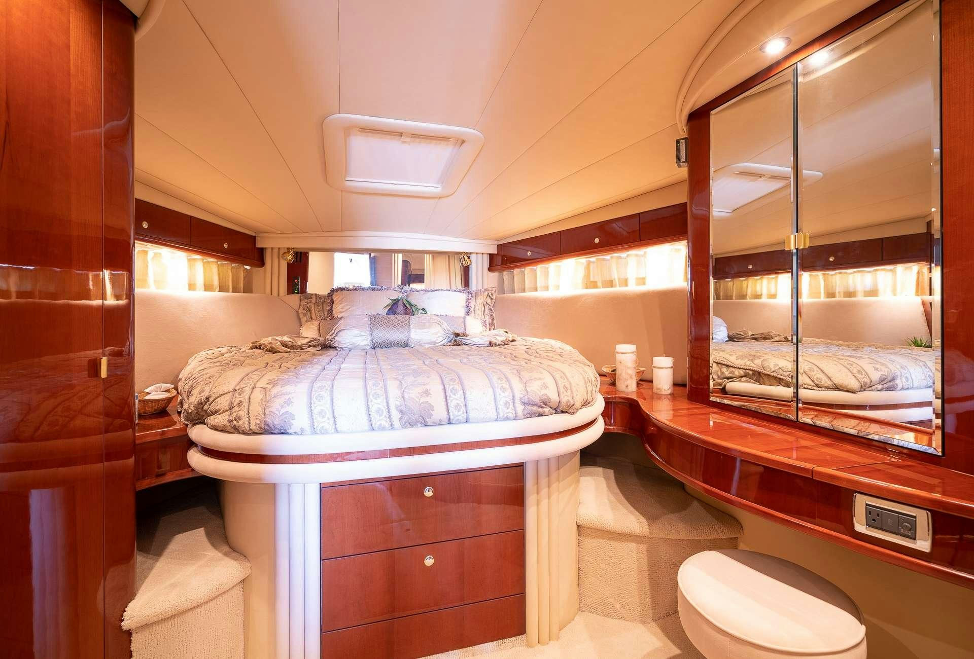 a bathroom with a large mirror aboard XOXO Yacht for Charter