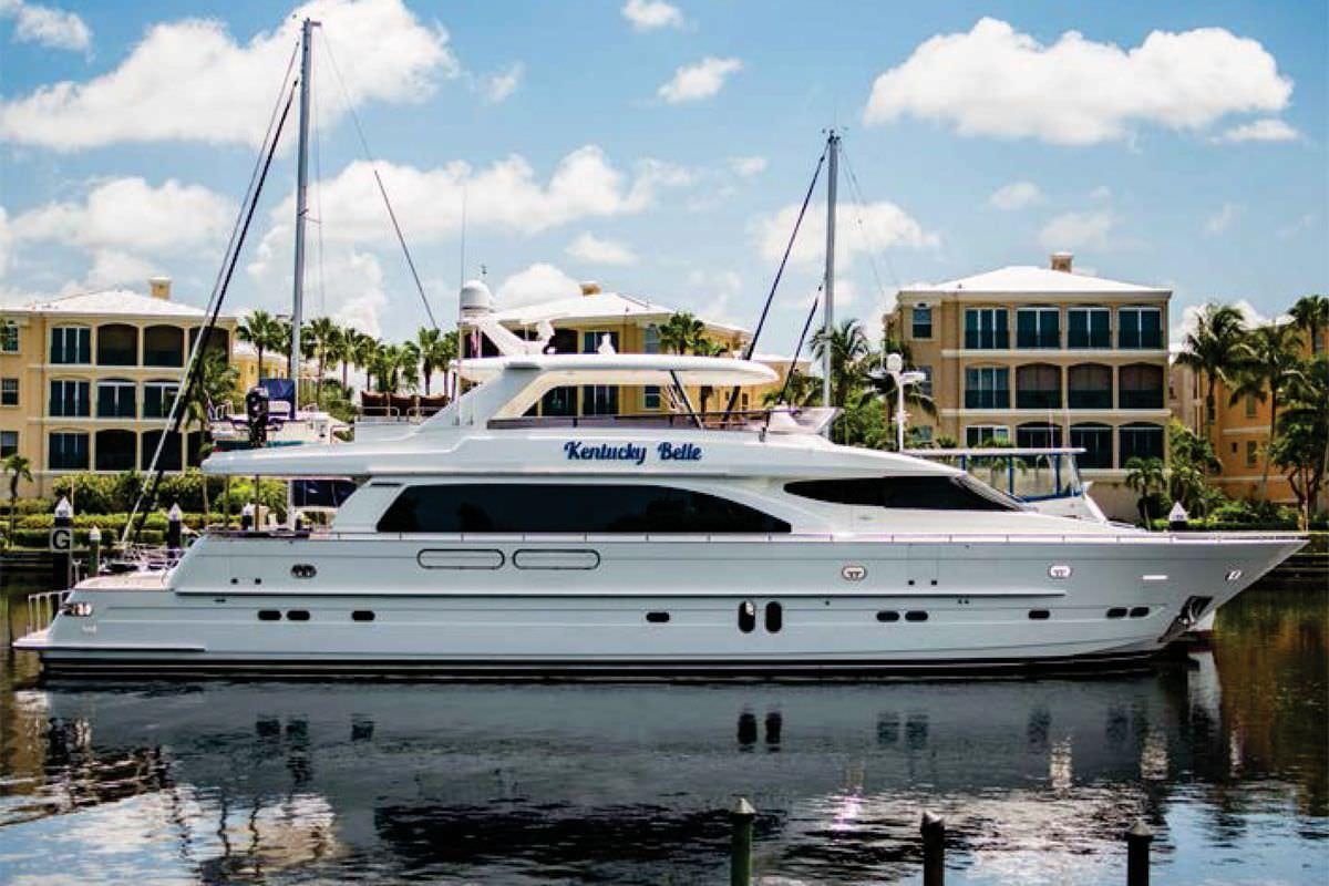 a white boat on water aboard KENTUCKY BELLE Yacht for Charter