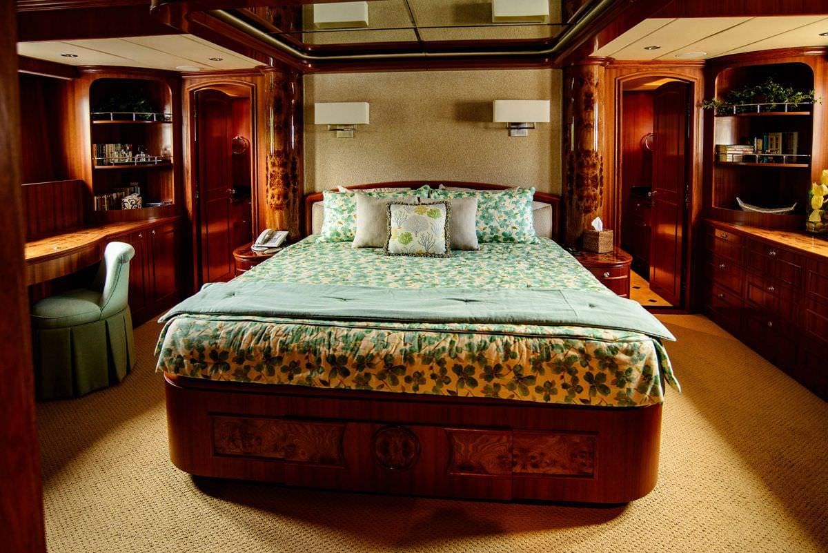 a bed in a room aboard KENTUCKY BELLE Yacht for Charter