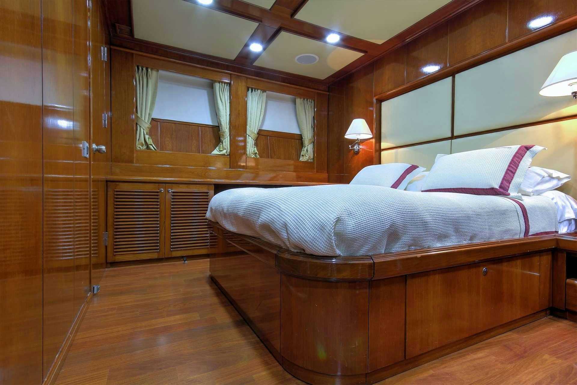 a bed in a room aboard SEA DREAM Yacht for Charter