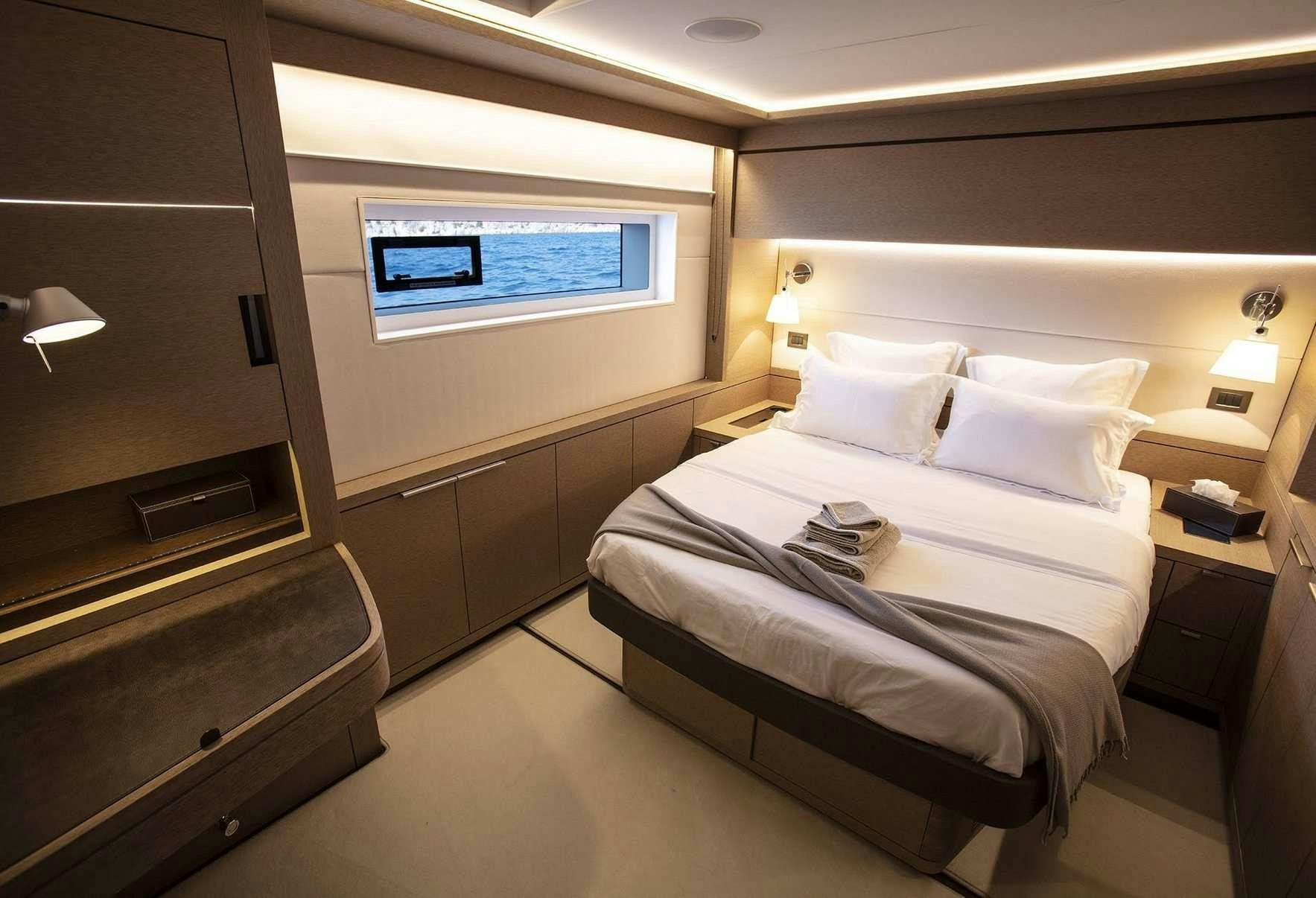 a room with two beds aboard BABAC Yacht for Charter