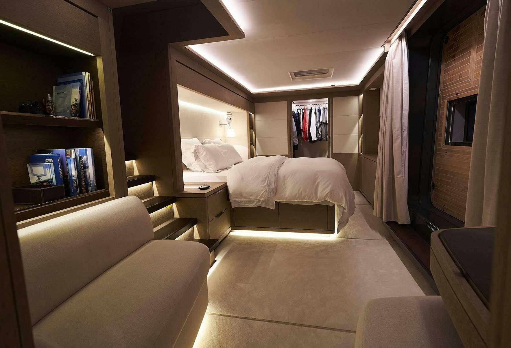 a room with two beds aboard BABAC Yacht for Charter
