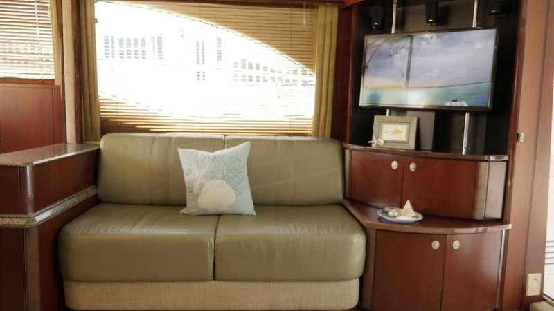 a couch in a room aboard FUN CLUB Yacht for Charter