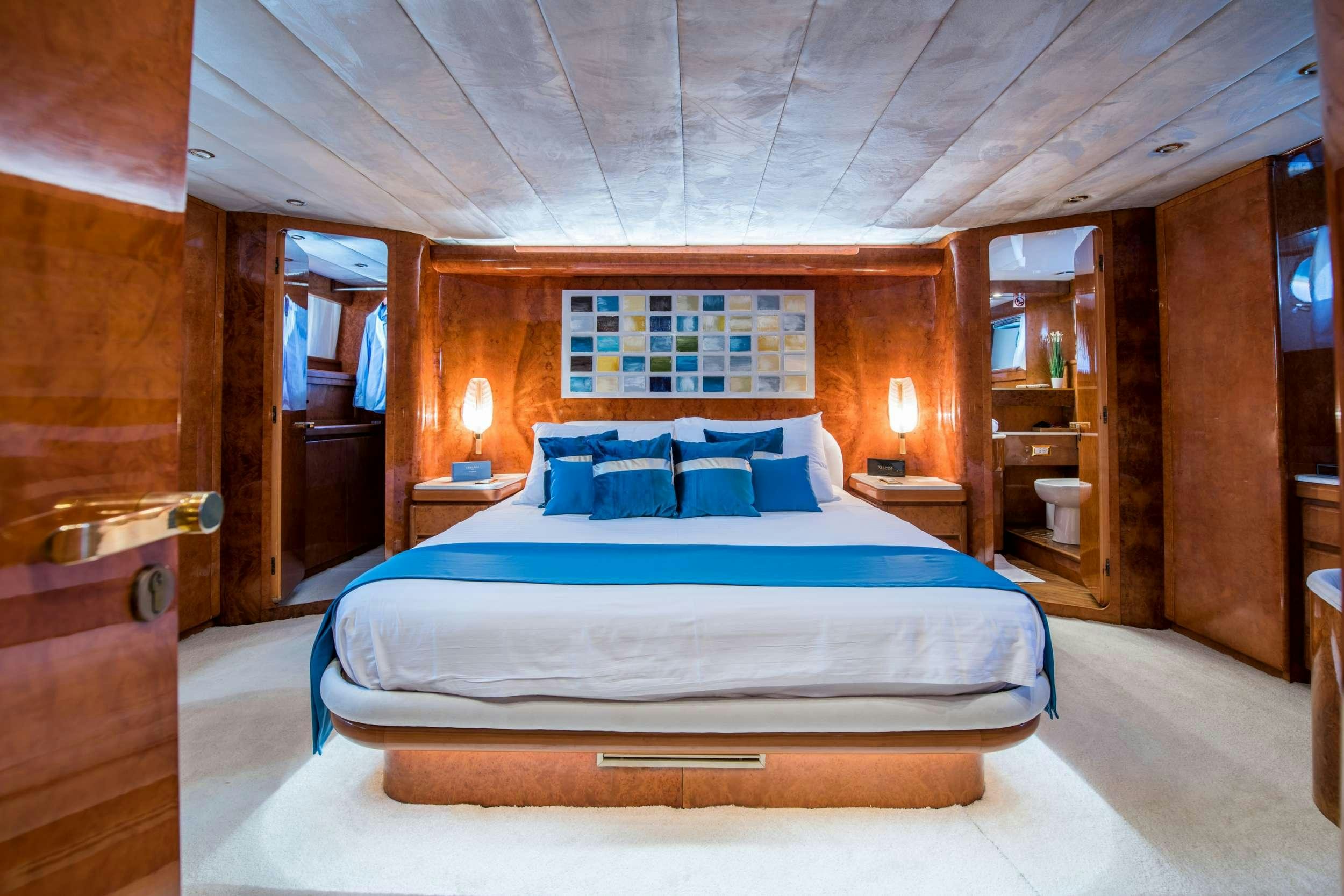 a bed in a room aboard BORA BORA Yacht for Charter