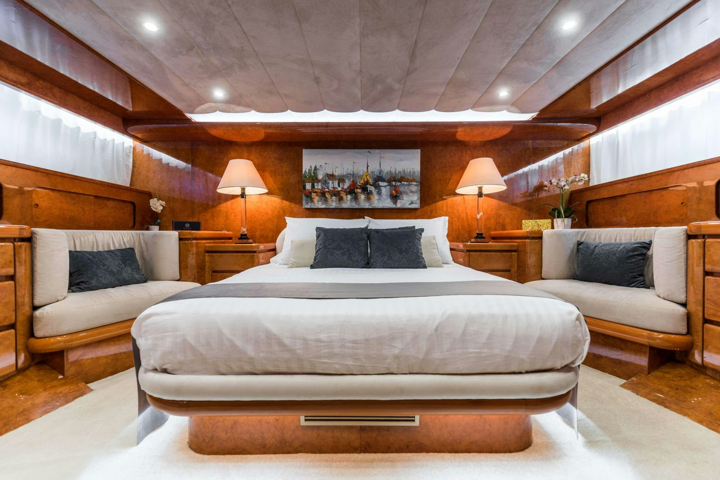 a bed in a room aboard BORA BORA Yacht for Charter
