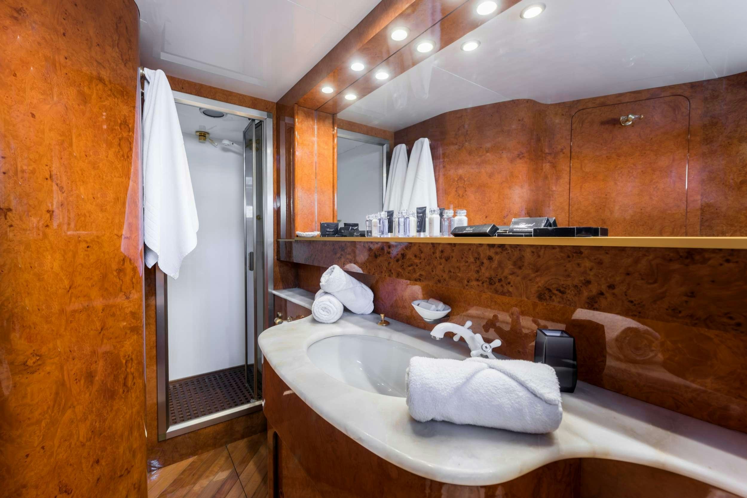 a bathroom with a large bathtub aboard BORA BORA Yacht for Charter