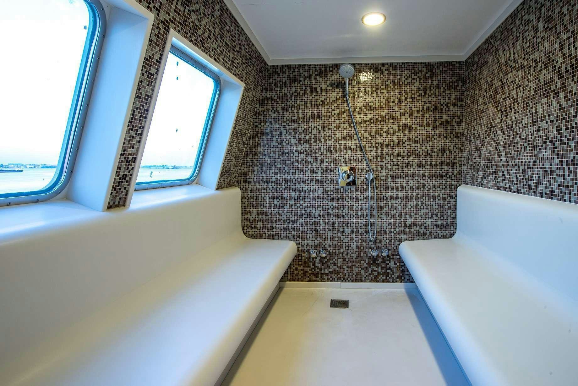 a laptop on a table aboard LAUREN L Yacht for Charter