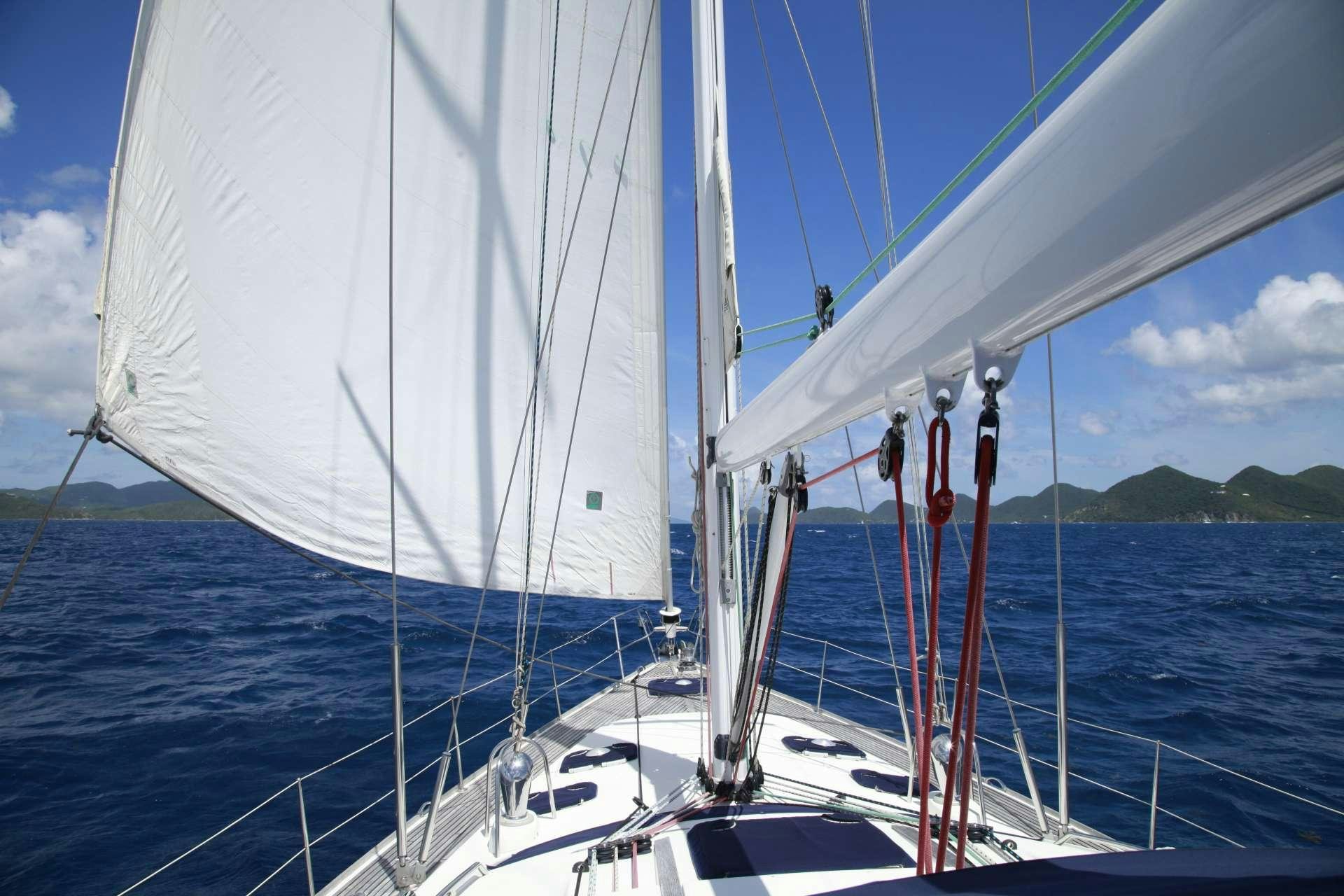 a sailboat on the water aboard SAYANG Yacht for Charter