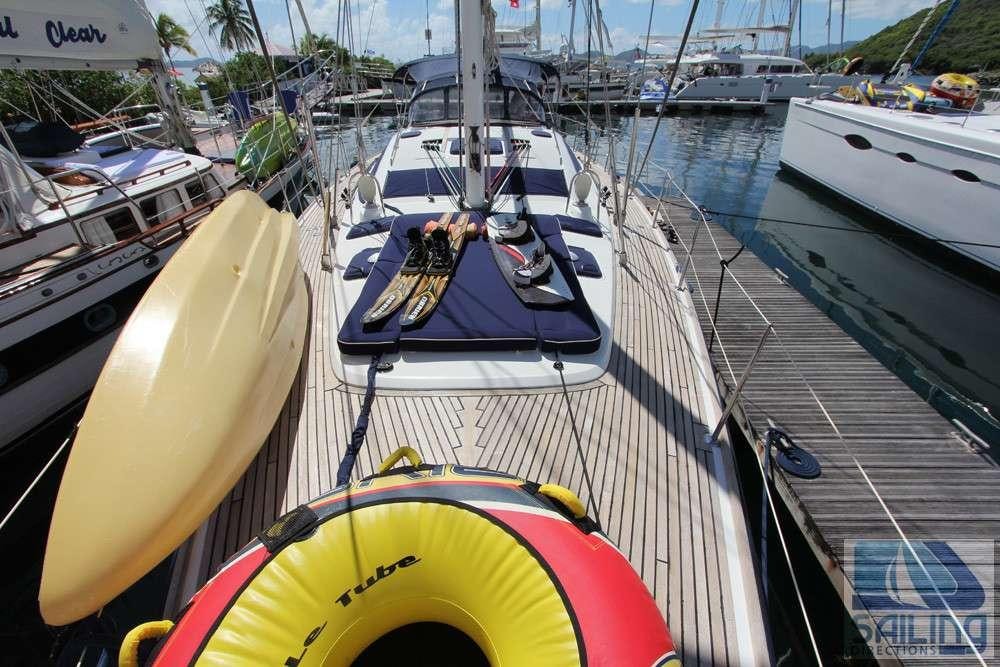 boats docked at a pier aboard SAYANG Yacht for Charter