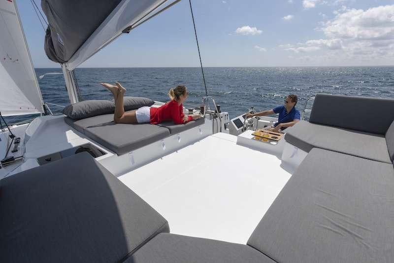 people sitting on a boat aboard CHAMPAGNE Yacht for Charter