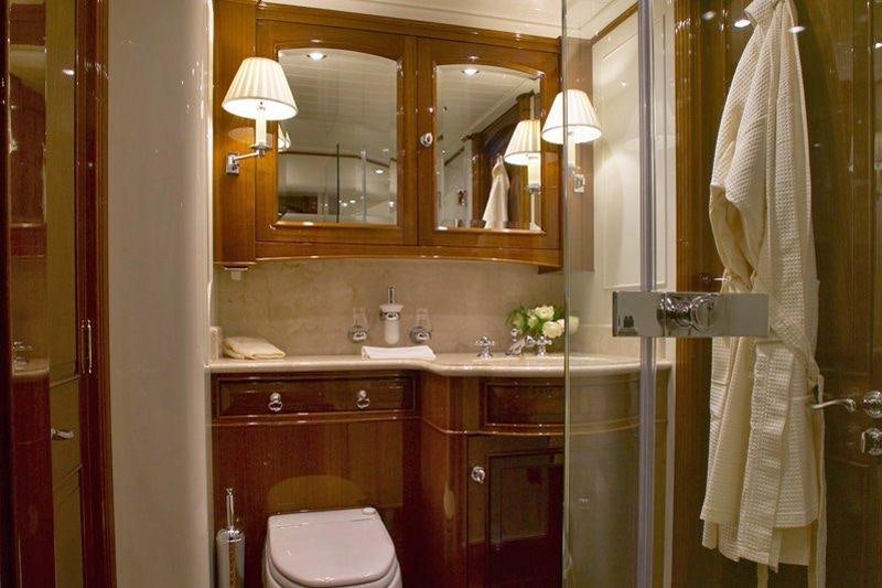 a bathroom with a sink and toilet aboard WHISPER Yacht for Charter