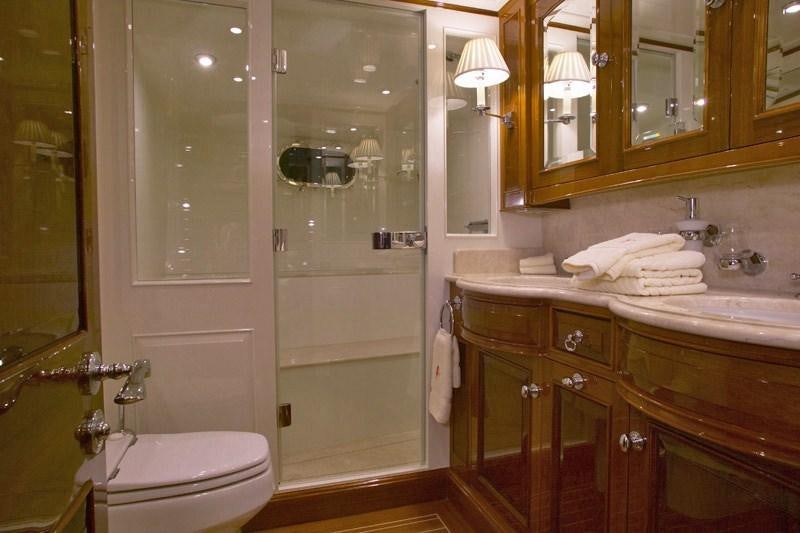 a bathroom with a sink and toilet aboard WHISPER Yacht for Charter