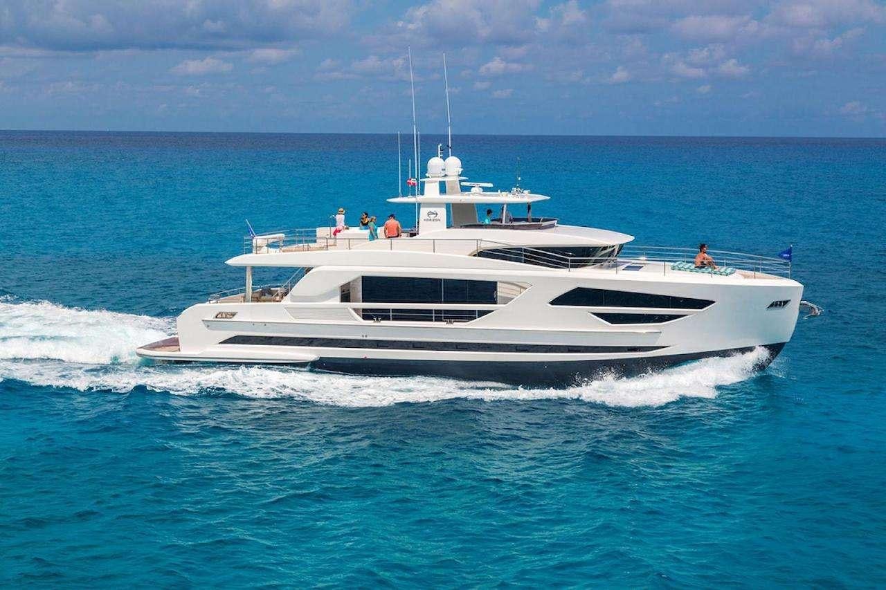 a white yacht in the water aboard MIDNIGHT MOON Yacht for Charter