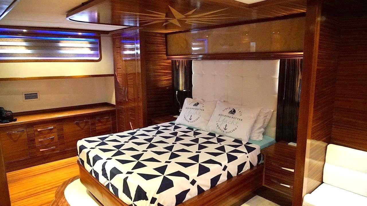 a bed in a room aboard SADIYE HANIM Yacht for Charter