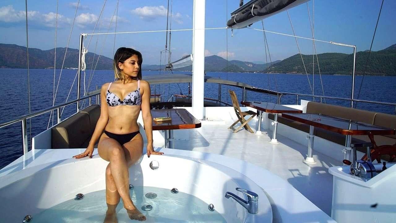 a person in a bikini on a boat aboard SADIYE HANIM Yacht for Charter