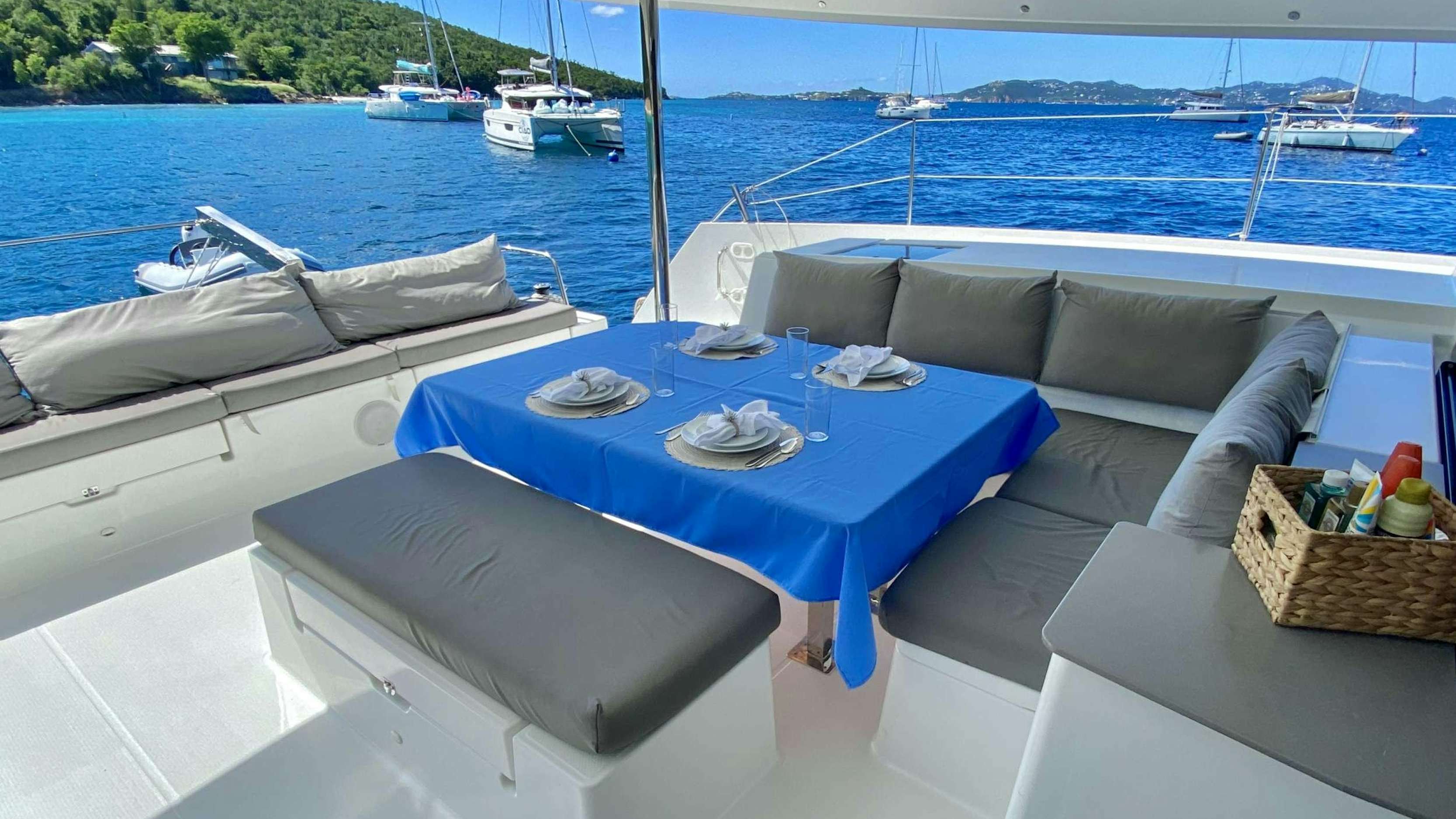 a table and chairs on a boat aboard KATRINA Yacht for Charter