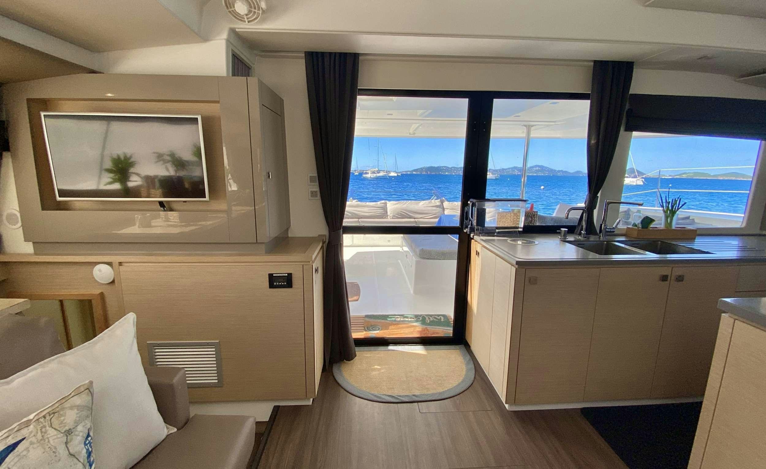 a room with a view of the ocean and the ocean aboard KATRINA Yacht for Charter