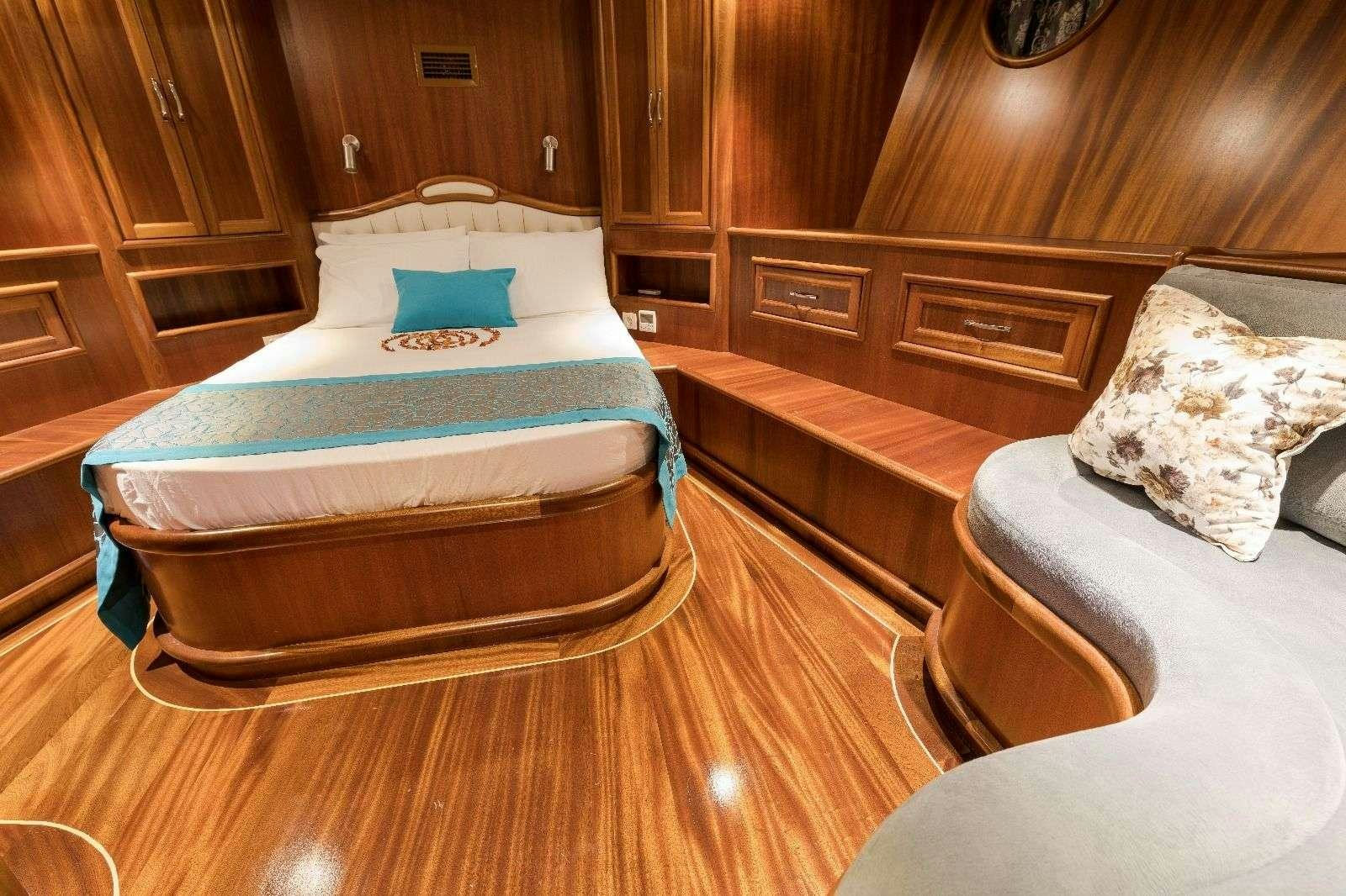 a bed in a room aboard KORAY EGE Yacht for Charter