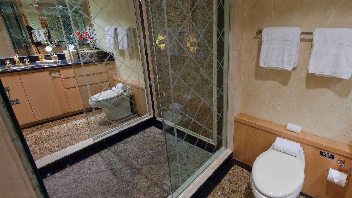 a bathroom with a glass shower aboard LUCKY STARS Yacht for Charter