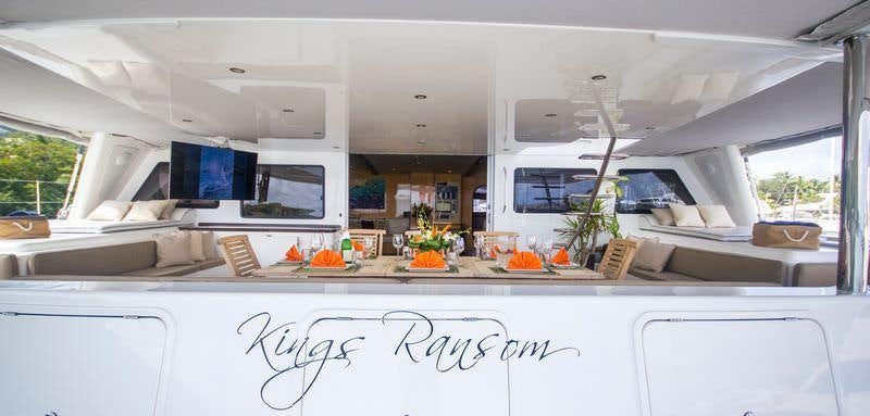 a white car with a window and a screen on the window aboard KINGS RANSOM Yacht for Charter