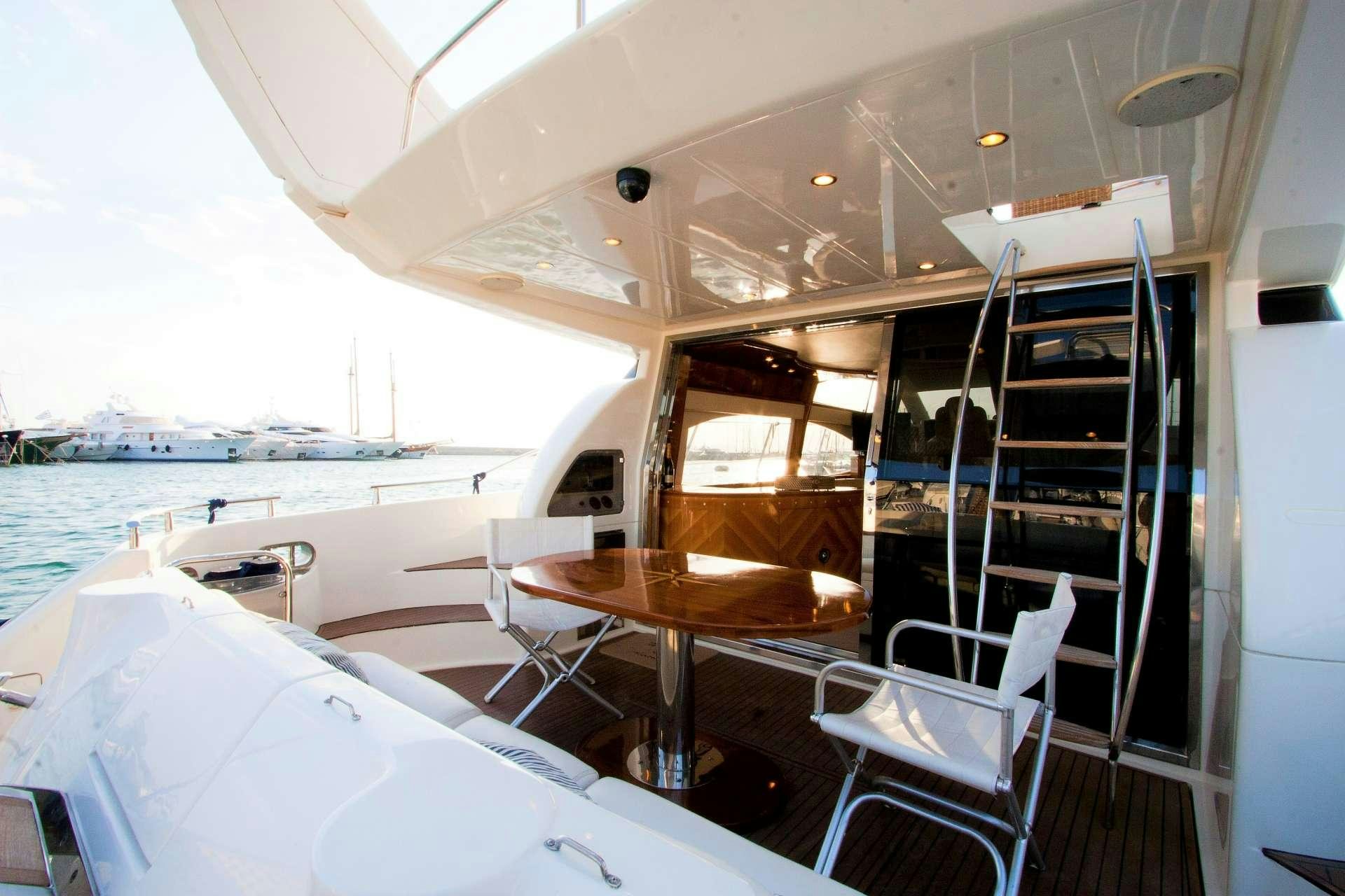 a boat with a ladder aboard AVENTURA II Yacht for Charter