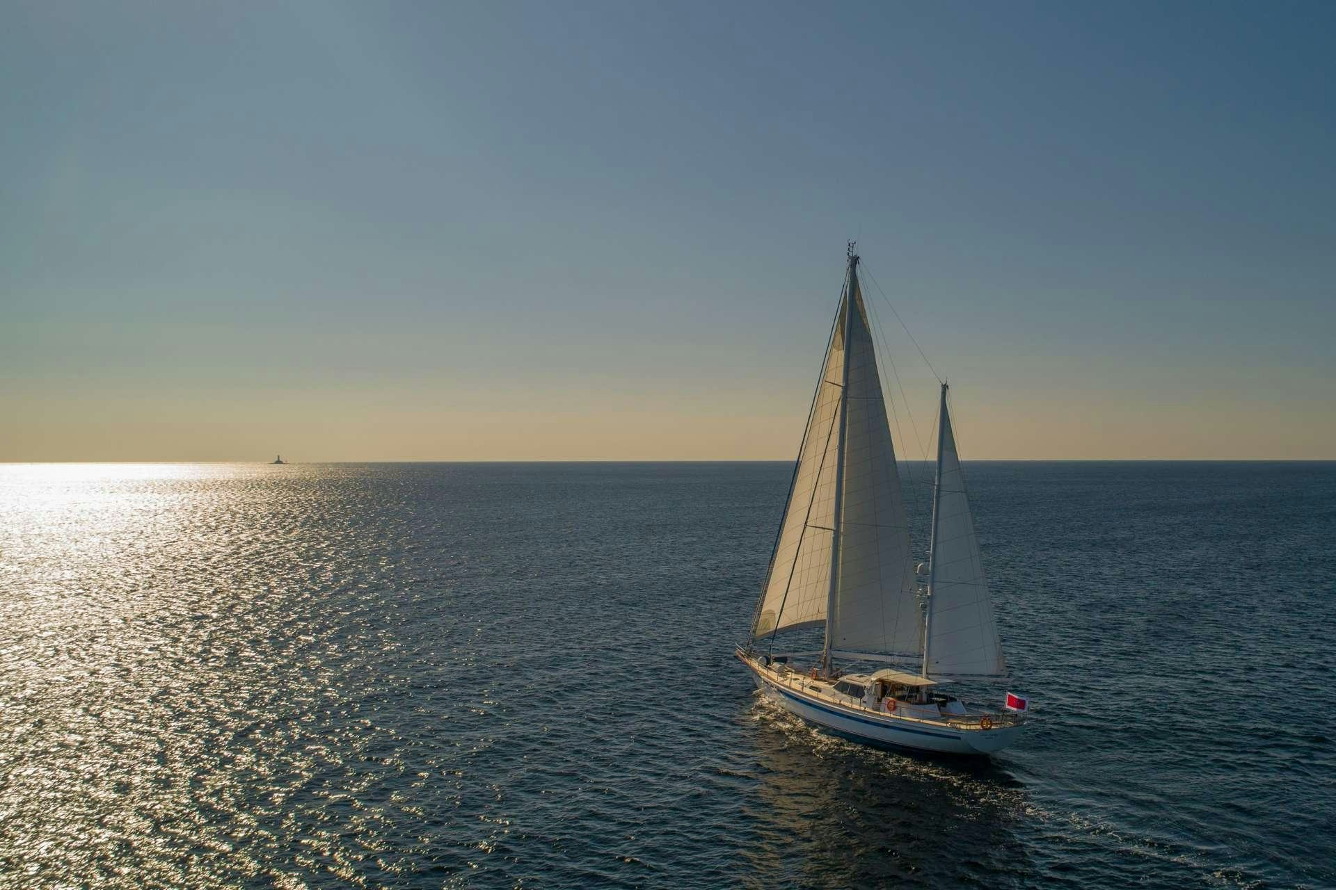a sailboat on the water aboard Free Wings Yacht for Charter