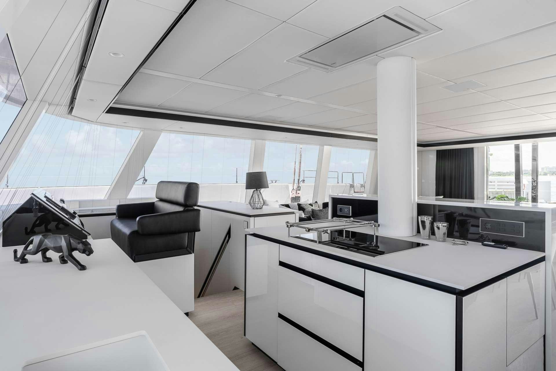 a room with a large window aboard ABOVE AND BEYOND Yacht for Charter