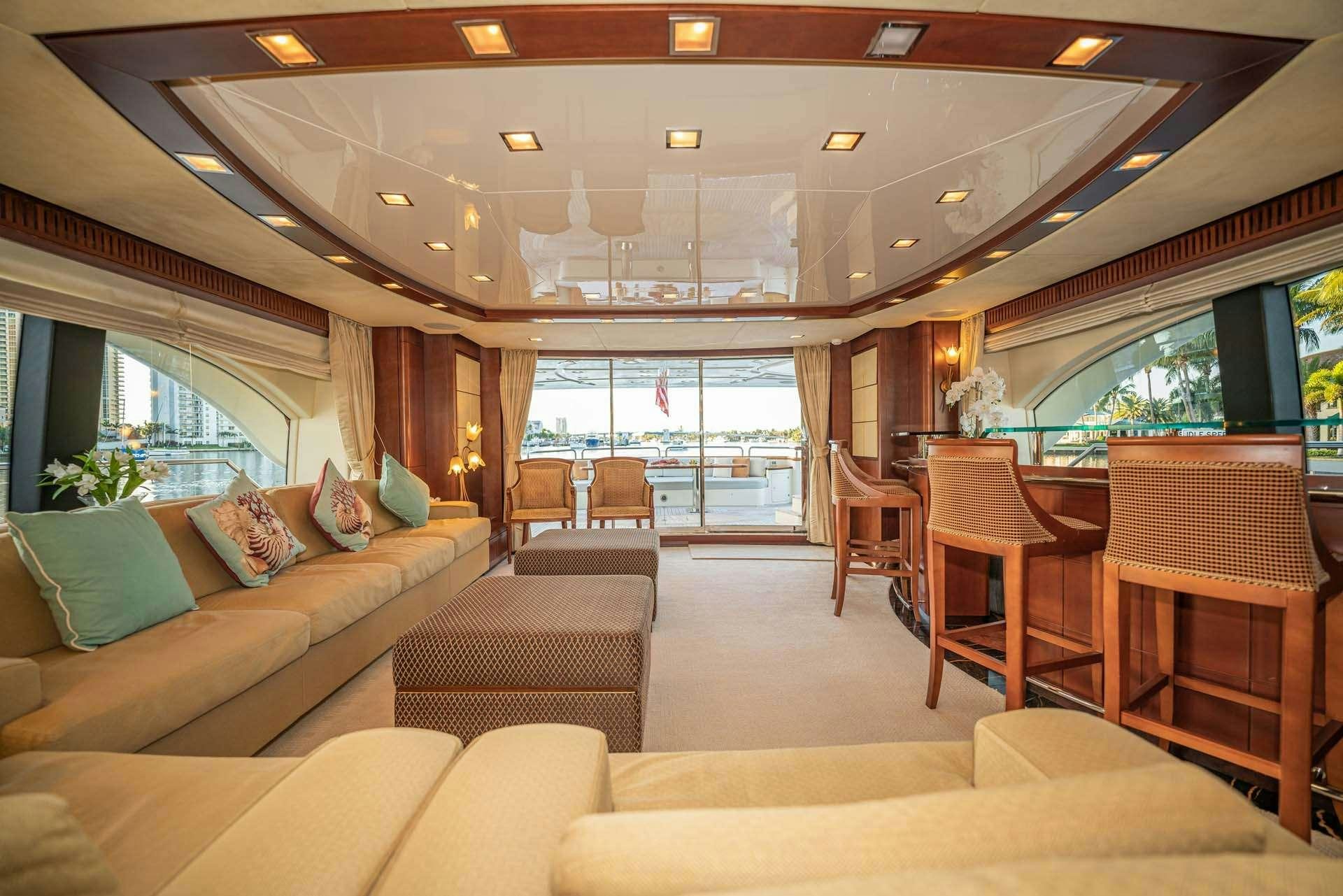 a living room with a couch and a table aboard VIVERE Yacht for Charter