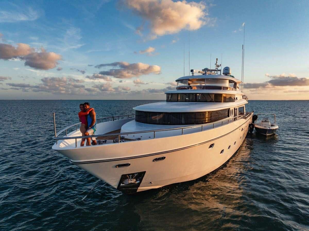 a couple of people on a boat aboard INCEPTION Yacht for Charter