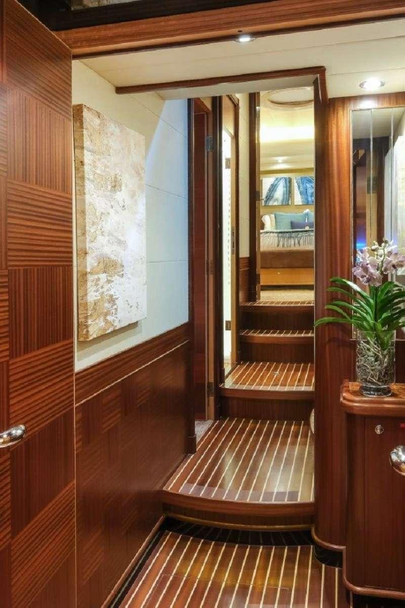a wooden door leading to a room aboard SILVER LINING Yacht for Charter