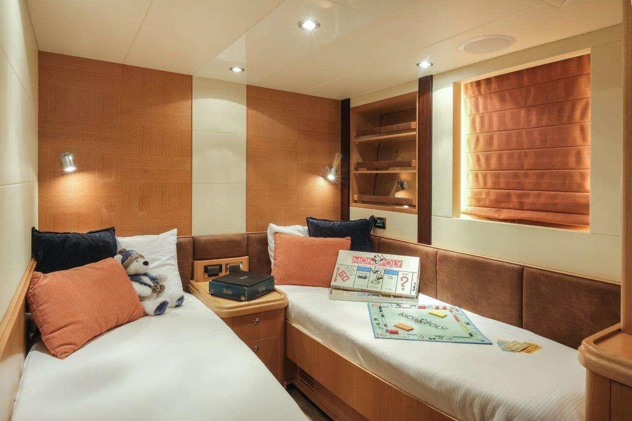a room with two beds aboard SILVER LINING Yacht for Charter