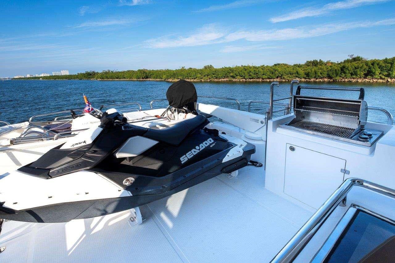 a person sitting on a boat aboard SILVER LINING Yacht for Charter