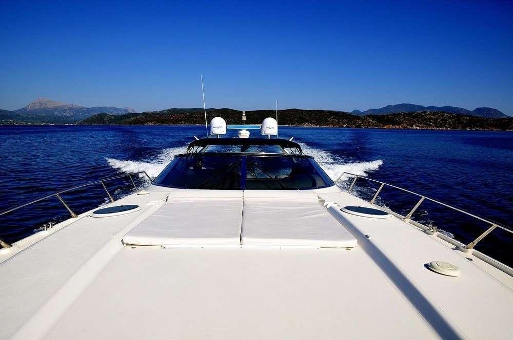 a boat on the water aboard OBSESSION Yacht for Charter
