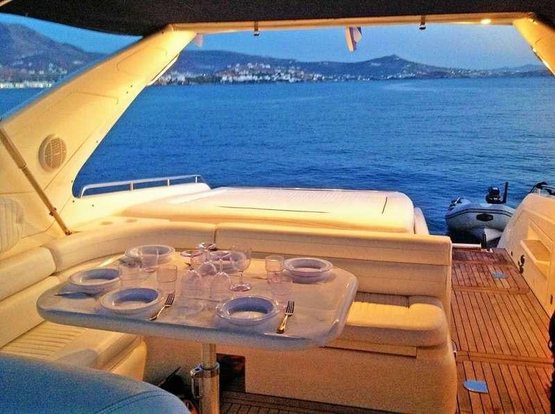a table on a boat aboard OBSESSION Yacht for Charter