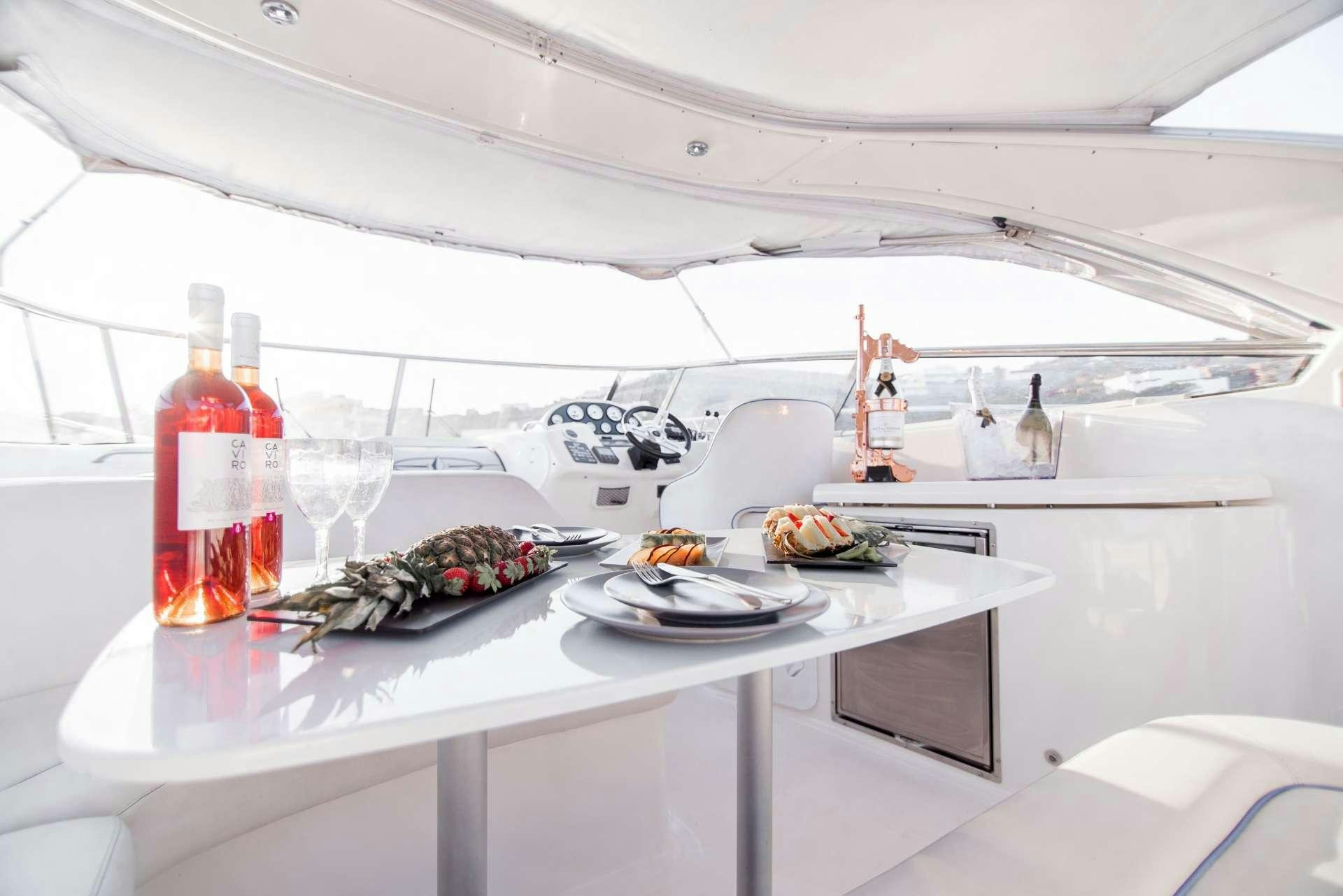 a table with food on it aboard AEGEAN BLUE Yacht for Charter