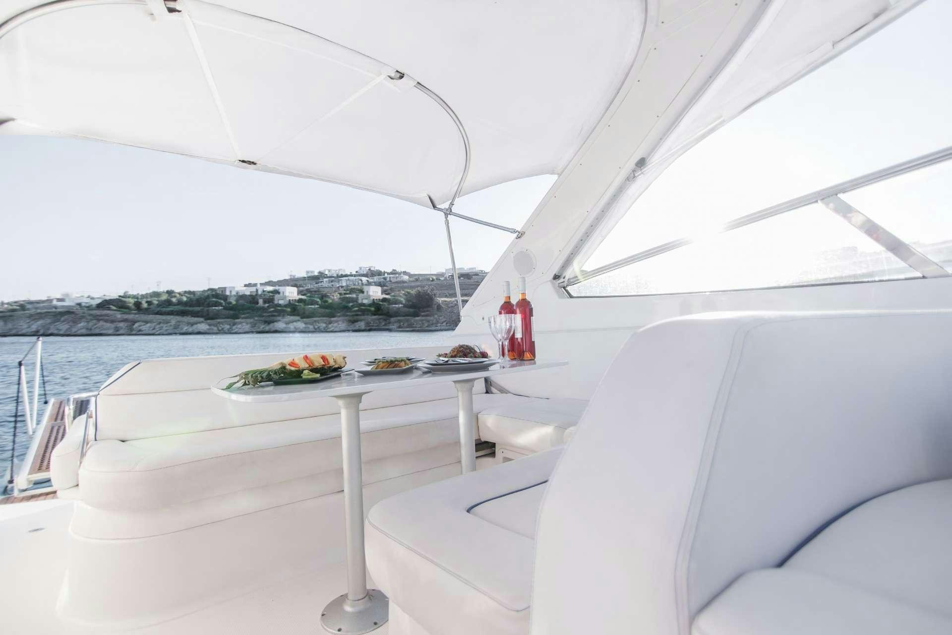 a table on a boat aboard AEGEAN BLUE Yacht for Charter