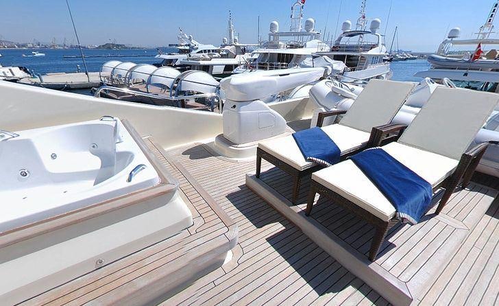 a deck with many boats aboard MERVE Yacht for Charter