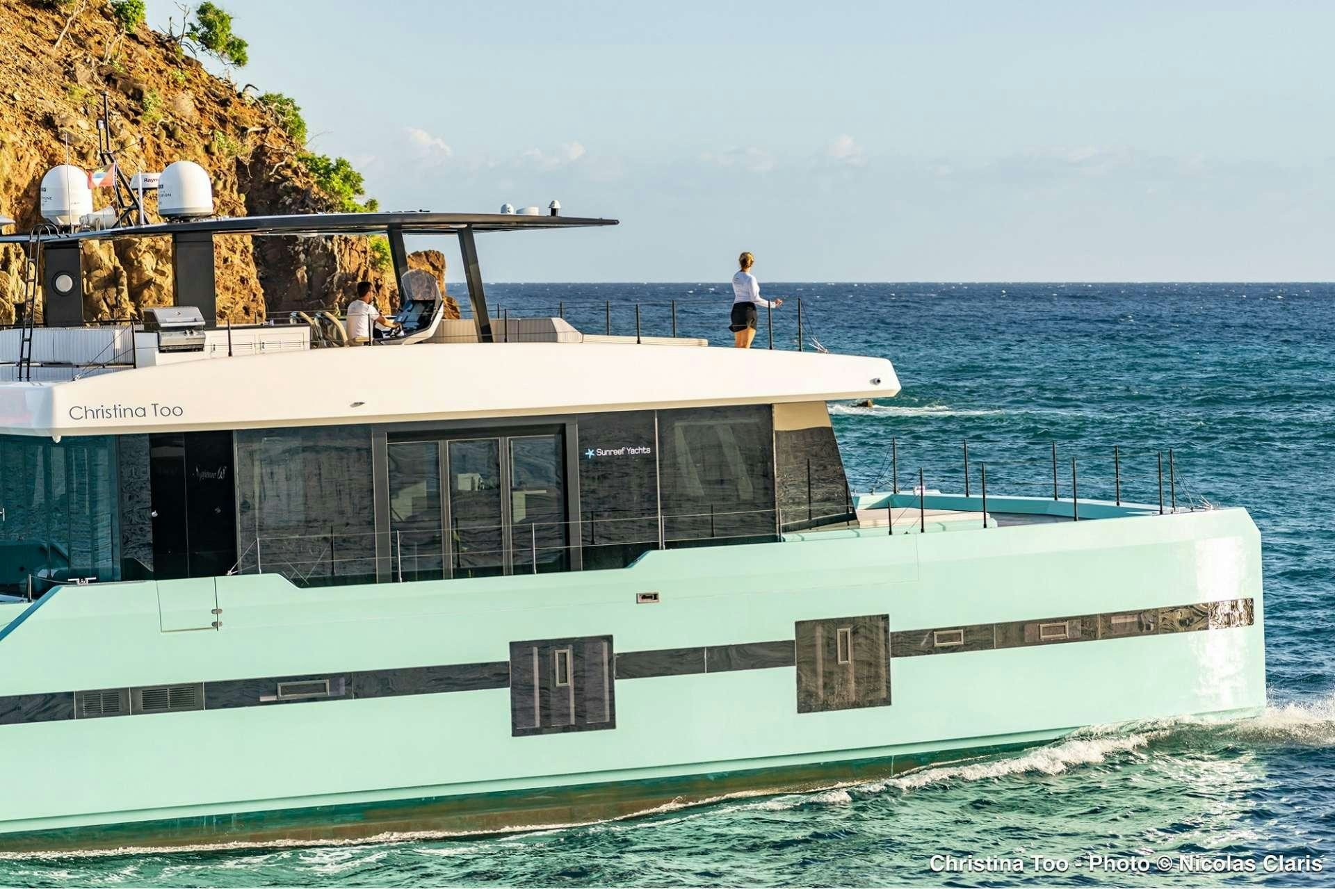 a boat with people on it aboard CHRISTINA TOO Yacht for Sale