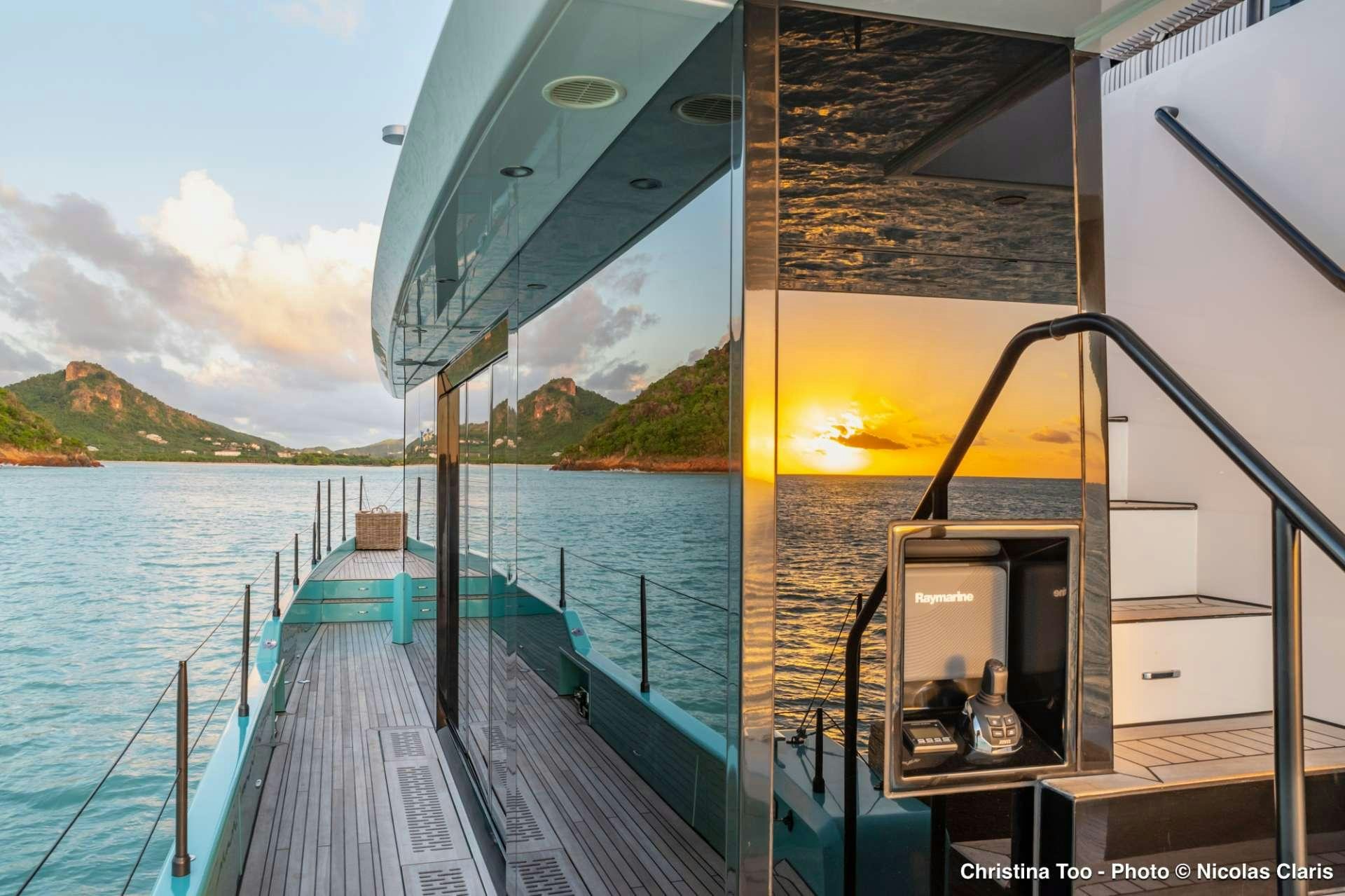 a boat on the water aboard CHRISTINA TOO Yacht for Sale