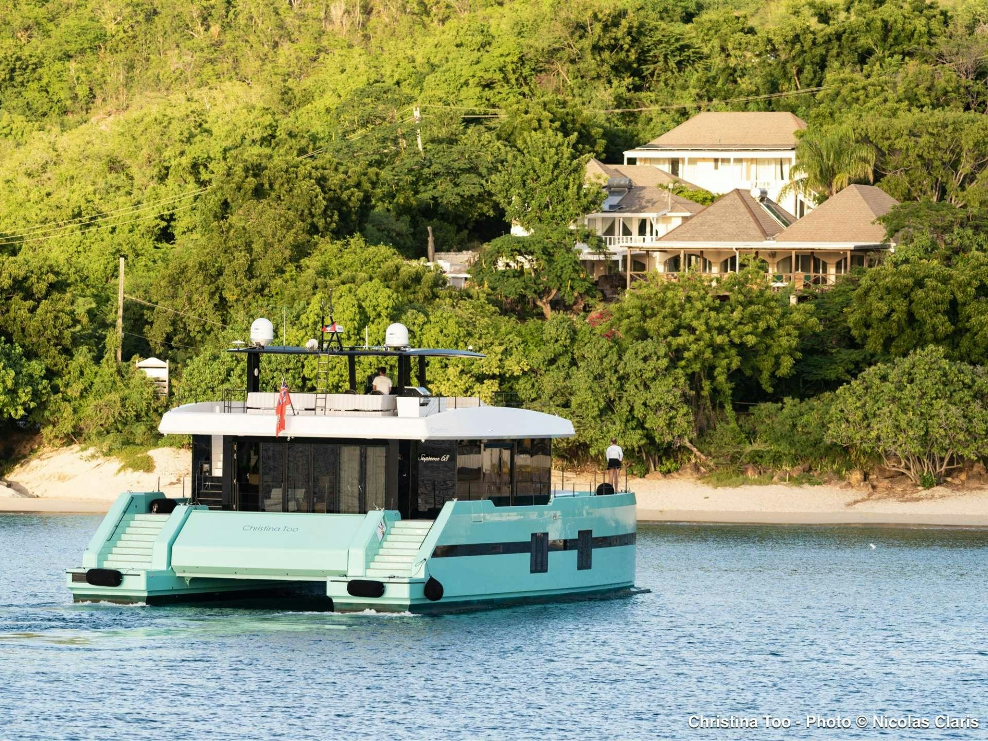 a boat on the water aboard CHRISTINA TOO Yacht for Charter