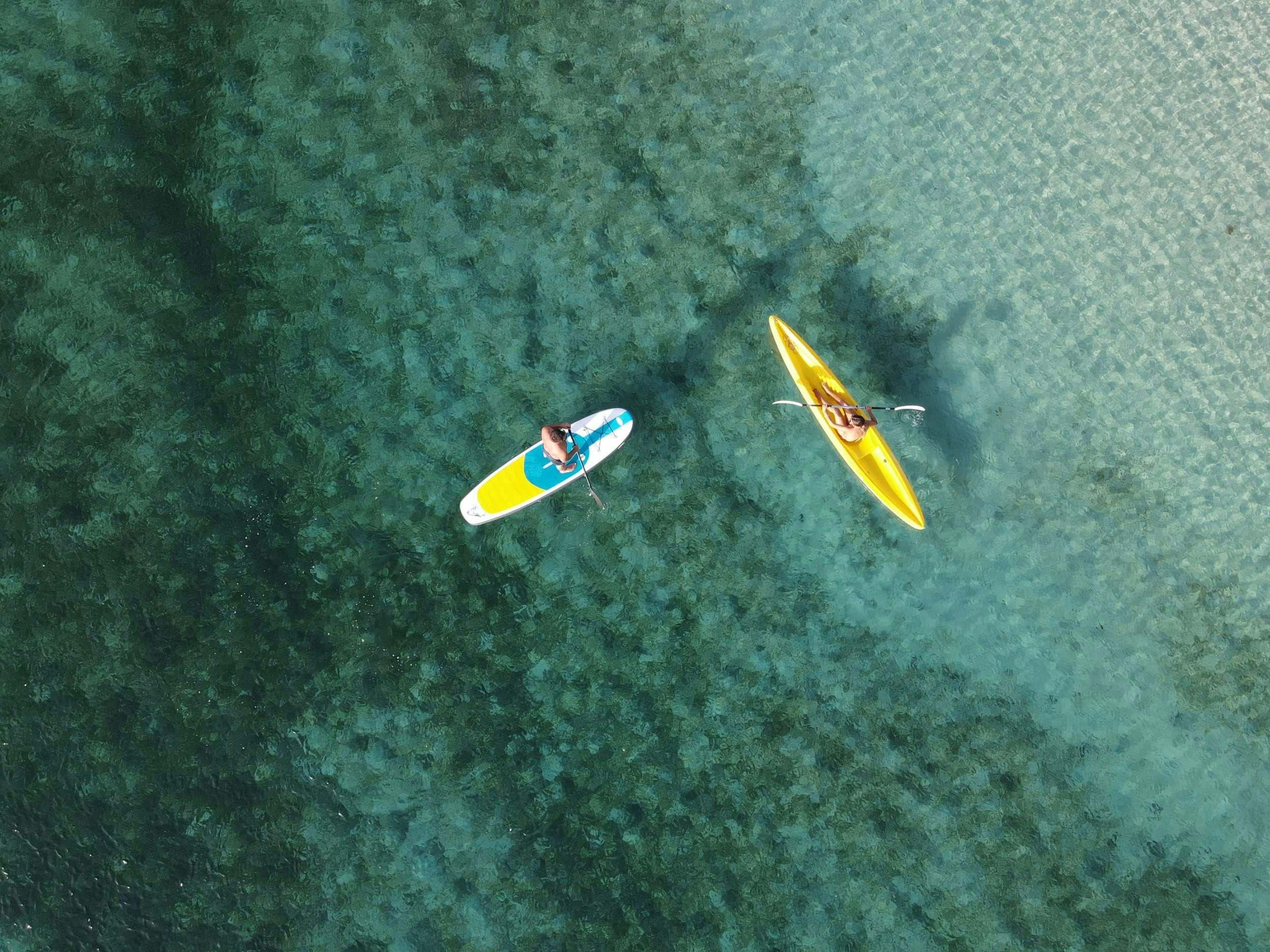 a kayak in the water aboard NEMO Yacht for Charter